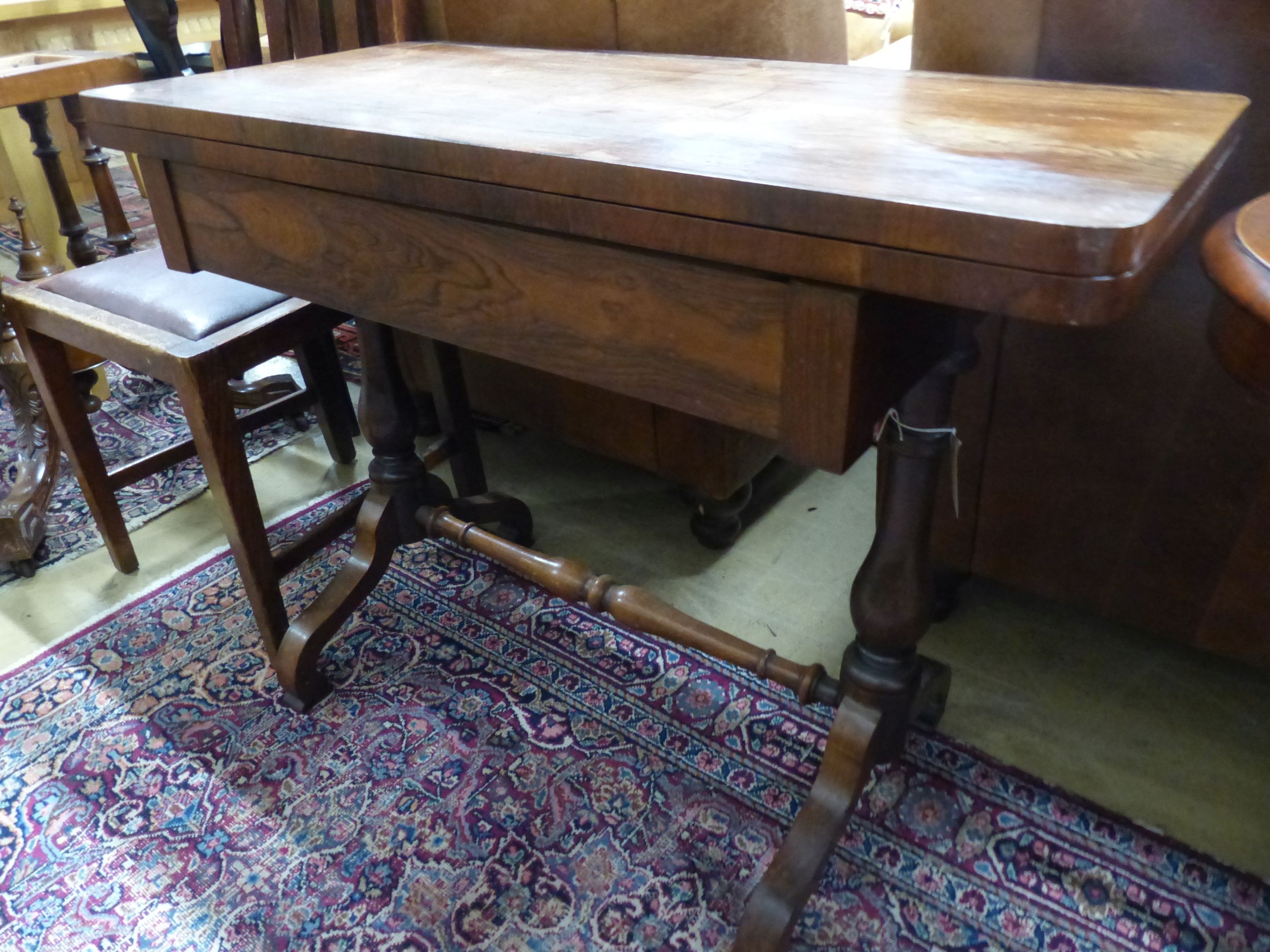 A Victorian rosewood rectangular folding card table, W.91cm D.45cm H.73cm, and an Arts and Crafts oak dining chair